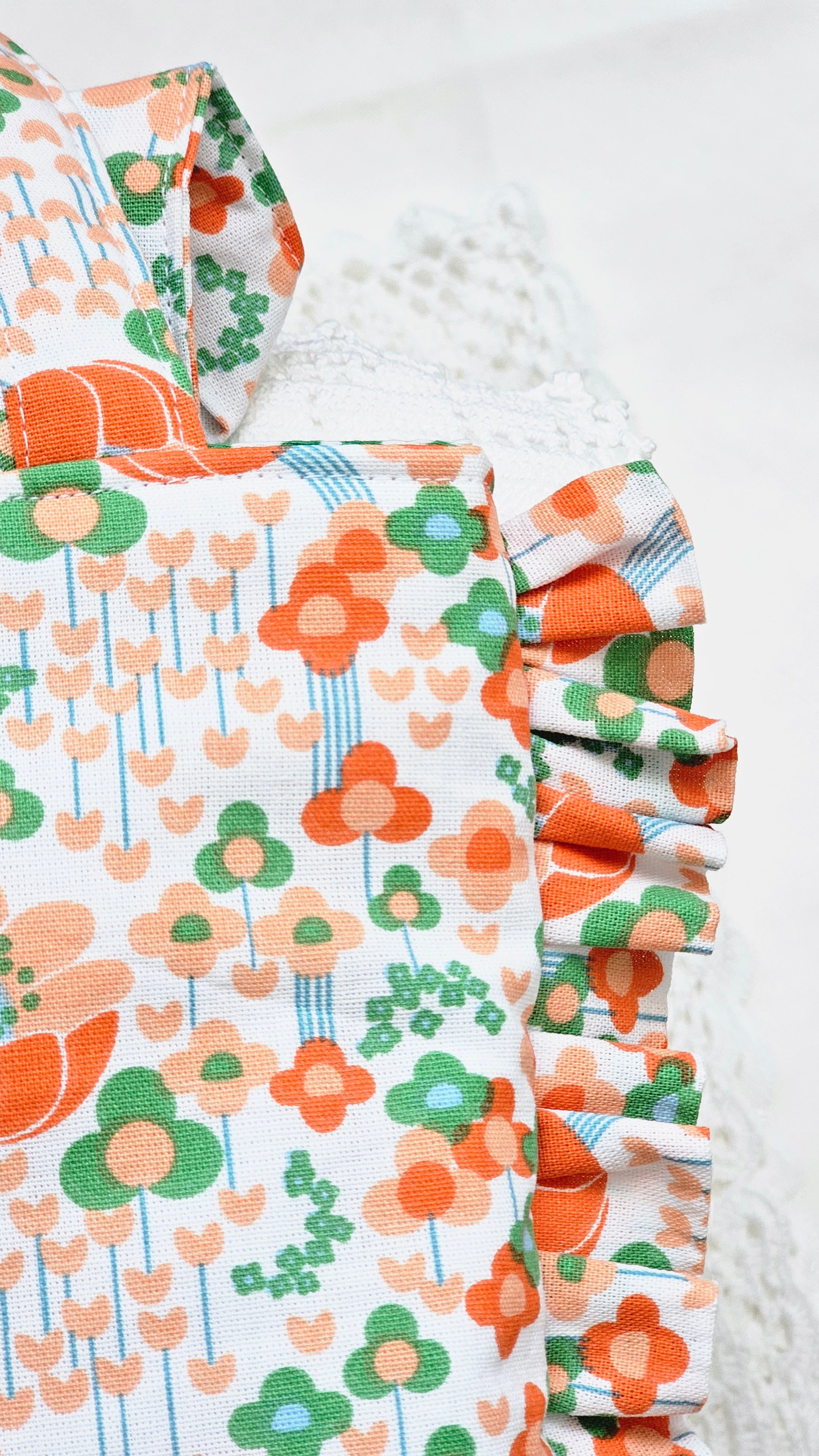 Sac à volants et trousse tissu fleuri orange