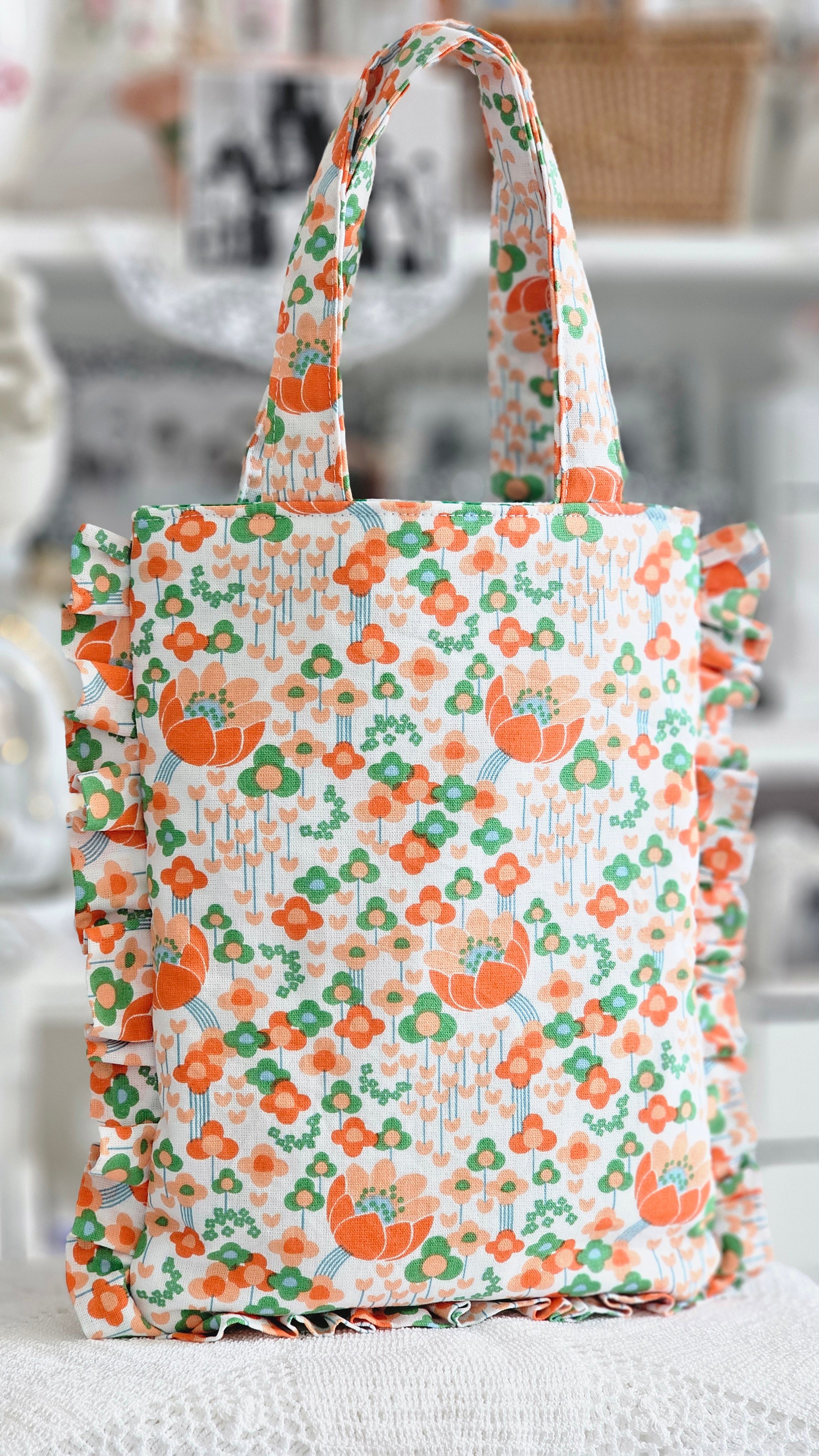 Sac à volants et trousse tissu fleuri orange