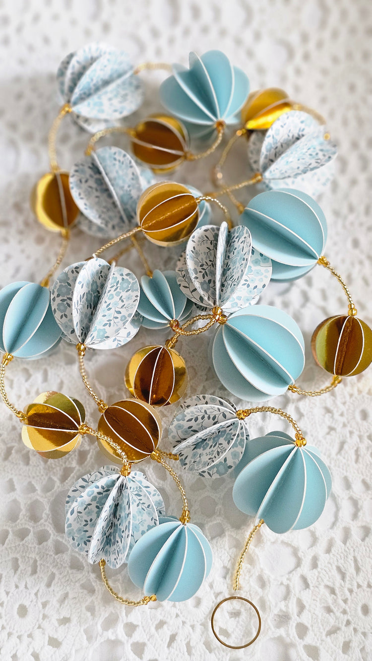 Guirlande en papier décorative bleu et dorée
