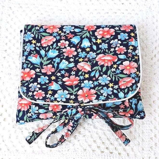 Pochette tissu coton fleuri et passepoil