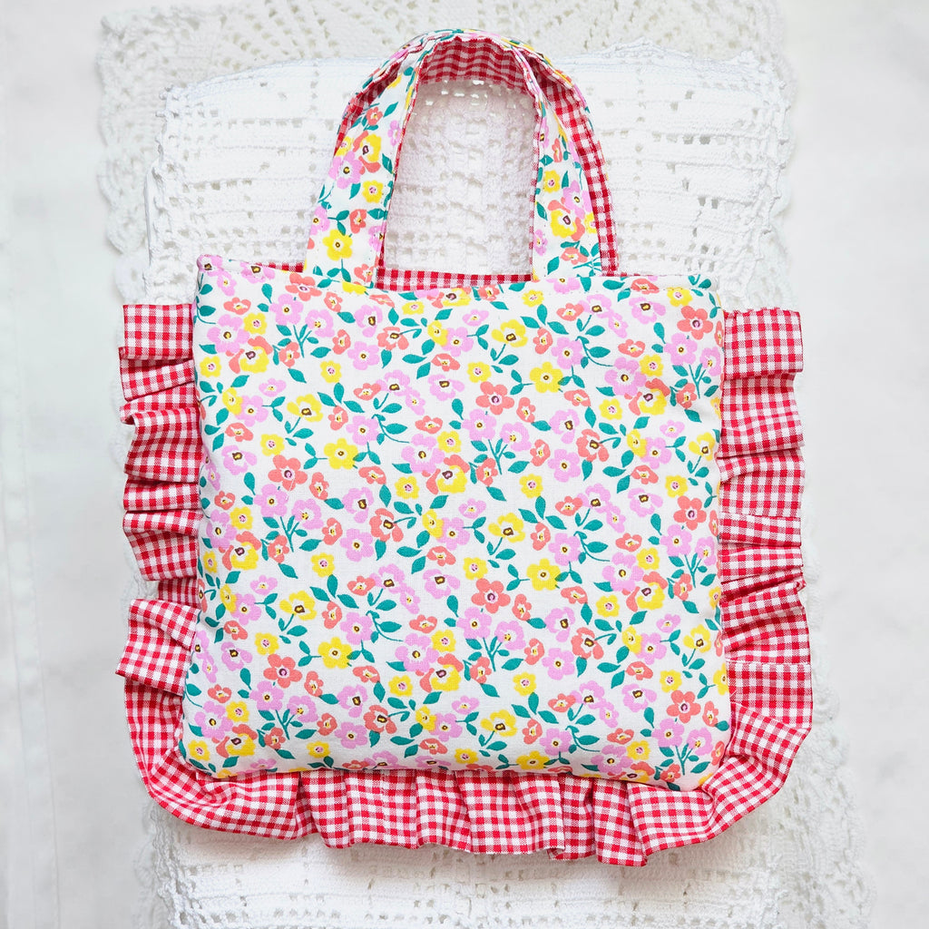 Pochette à volants tissu vichy rouge et tissu fleuri