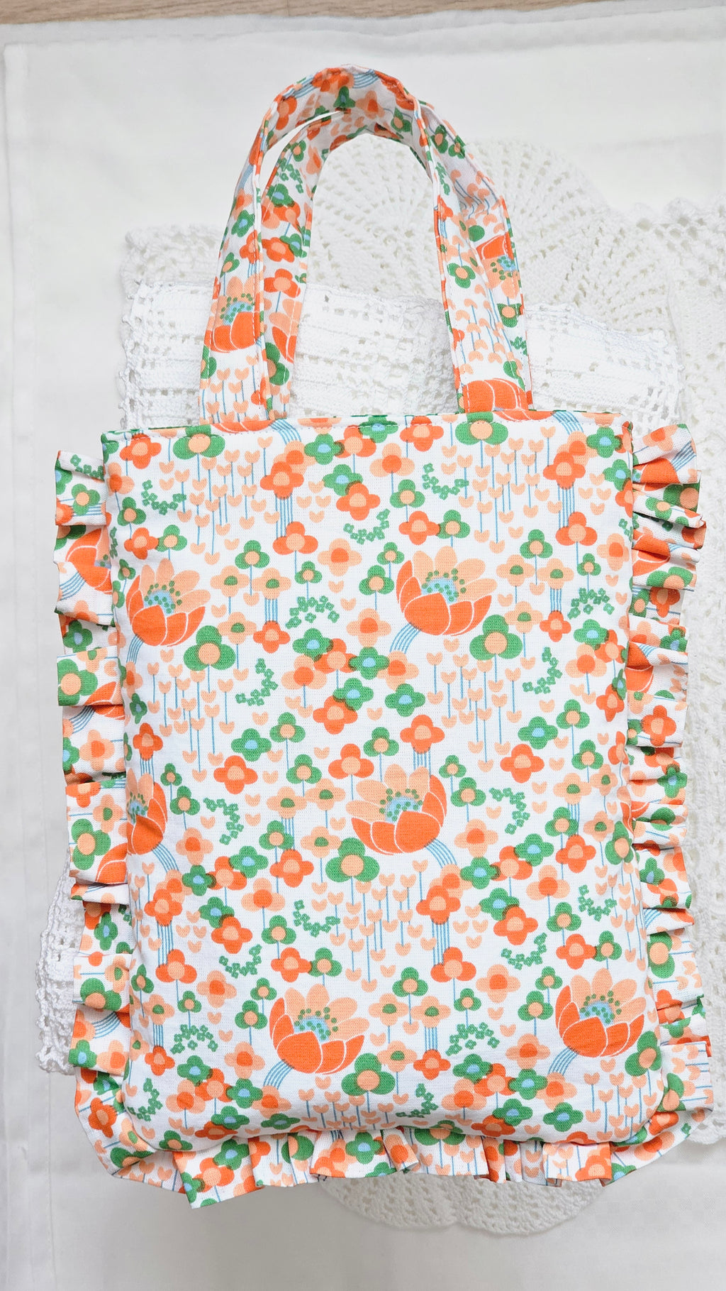 Sac à volants et trousse tissu fleuri orange