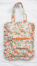 Sac à volants et trousse tissu fleuri orange