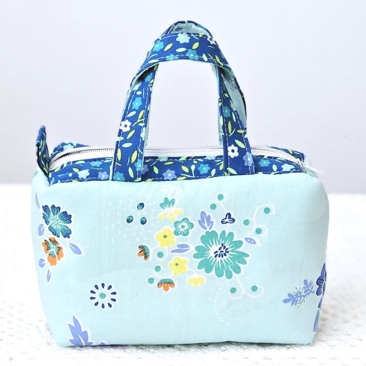 Mini trousse tissu fleuri bleu