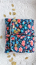 Pochette tissu coton fleuri et passepoil