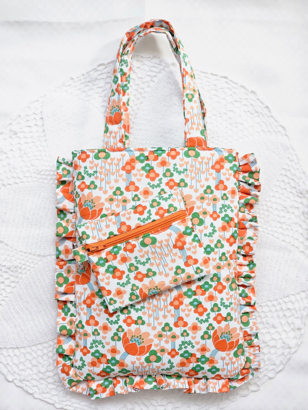 Sac à volants et trousse tissu fleuri orange