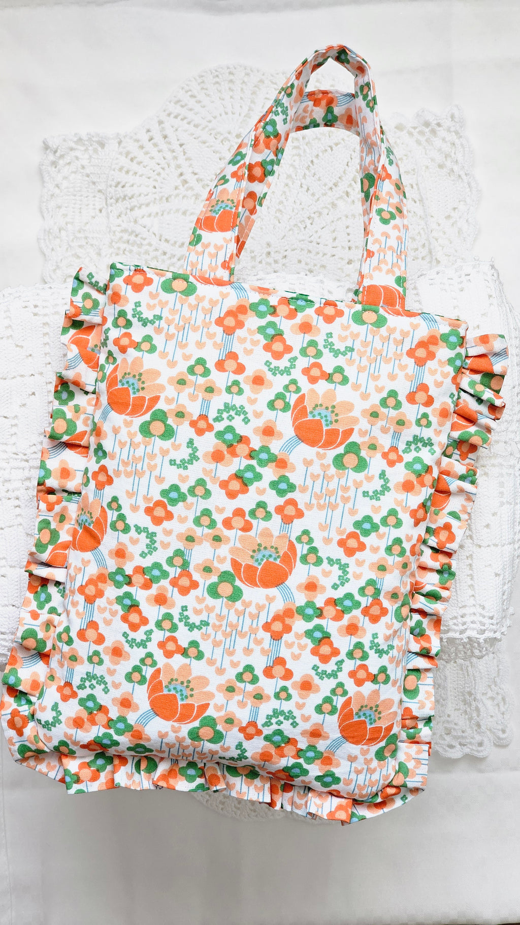 Sac à volants et trousse tissu fleuri orange
